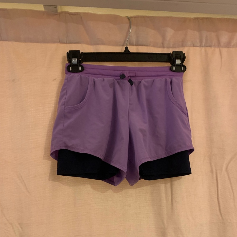 cute purple shorts with navy bicker shorts under